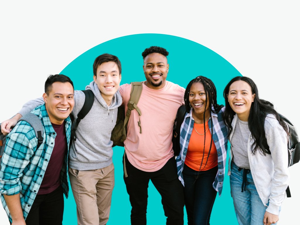 A group of five people smiling at the camera.